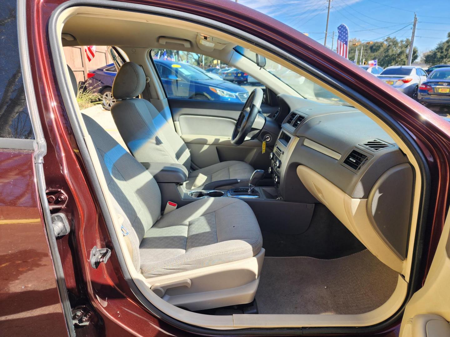 2012 Red /GRAY Ford Fusion (3FAHP0GAXCR) , located at 16710 Clay Rd., Houston, TX, 77084, (281) 859-7900, 29.834864, -95.656166 - Photo#12