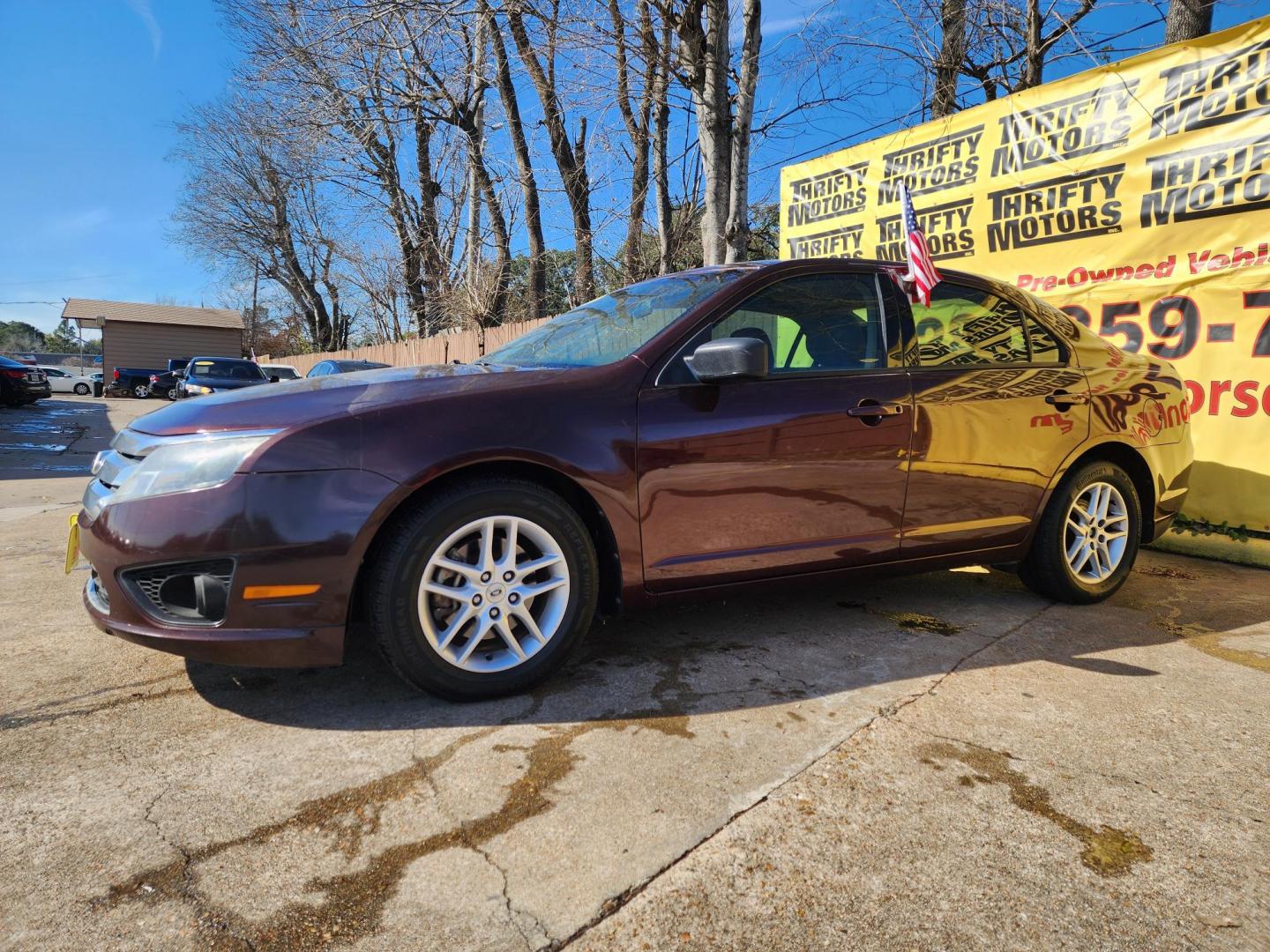 2012 Red /GRAY Ford Fusion (3FAHP0GAXCR) , located at 16710 Clay Rd., Houston, TX, 77084, (281) 859-7900, 29.834864, -95.656166 - Photo#1
