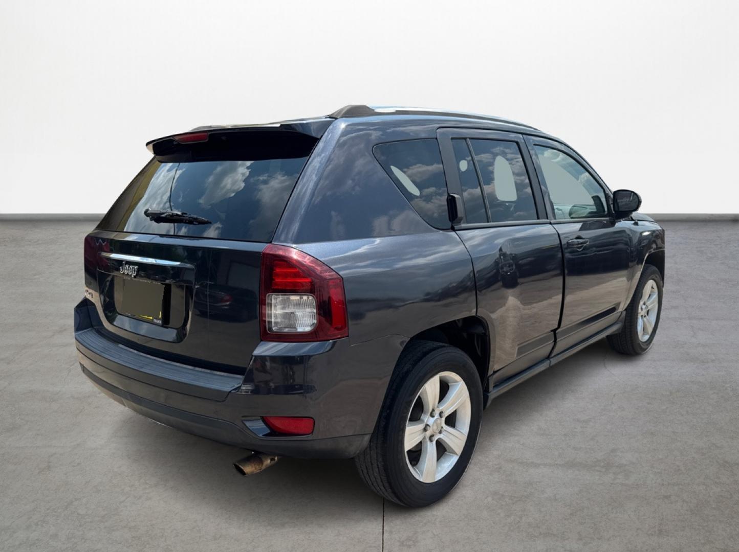 2014 Jeep Compass (1C4NJDBBXED) , located at 16710 Clay Rd., Houston, TX, 77084, (281) 859-7900, 29.834864, -95.656166 - Photo#4