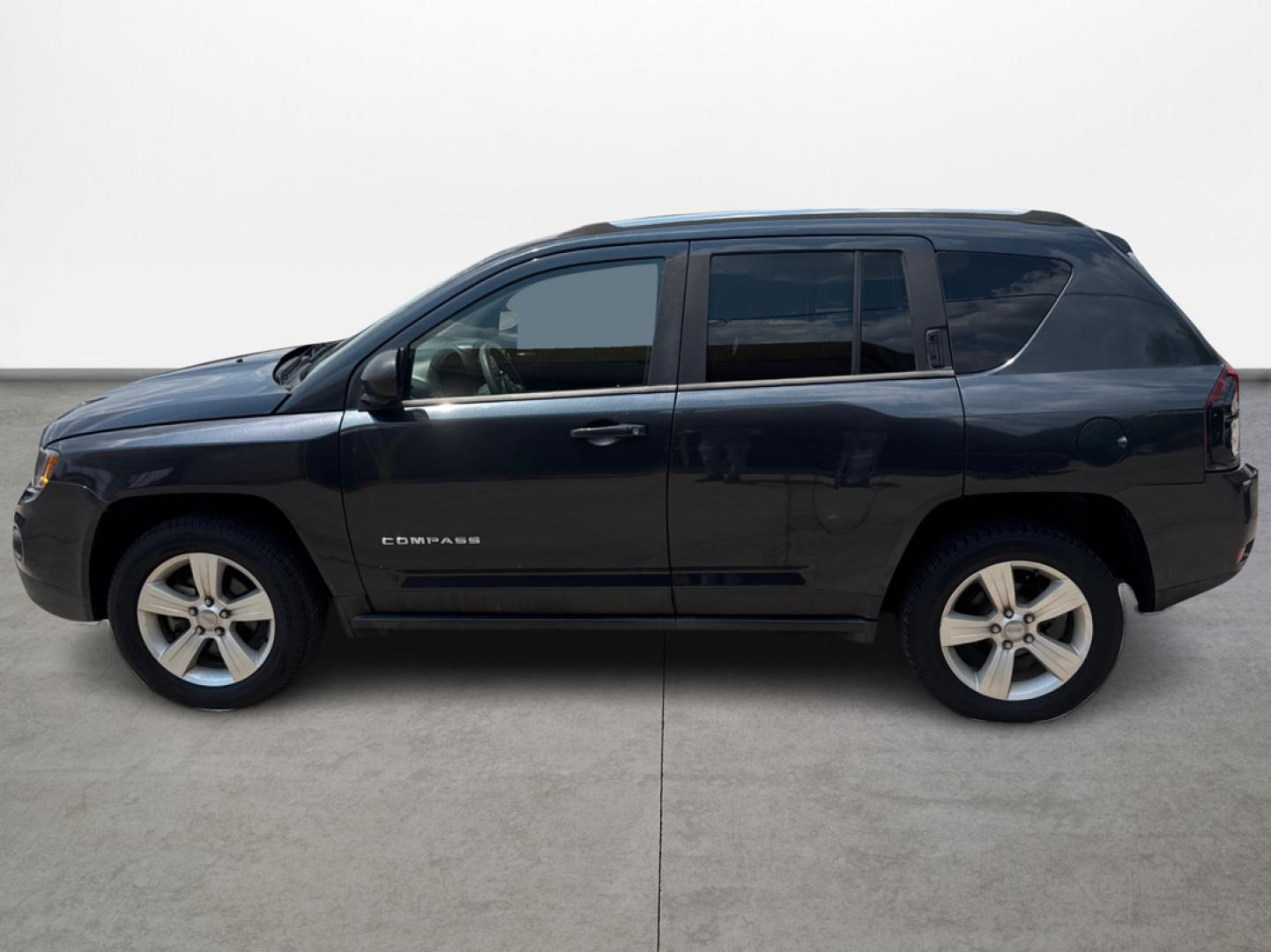 2014 Jeep Compass (1C4NJDBBXED) , located at 16710 Clay Rd., Houston, TX, 77084, (281) 859-7900, 29.834864, -95.656166 - Photo#7