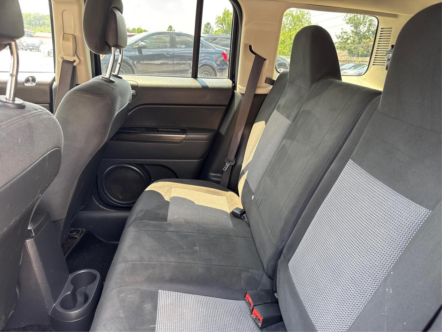 2014 Jeep Compass (1C4NJDBBXED) , located at 16710 Clay Rd., Houston, TX, 77084, (281) 859-7900, 29.834864, -95.656166 - Photo#9