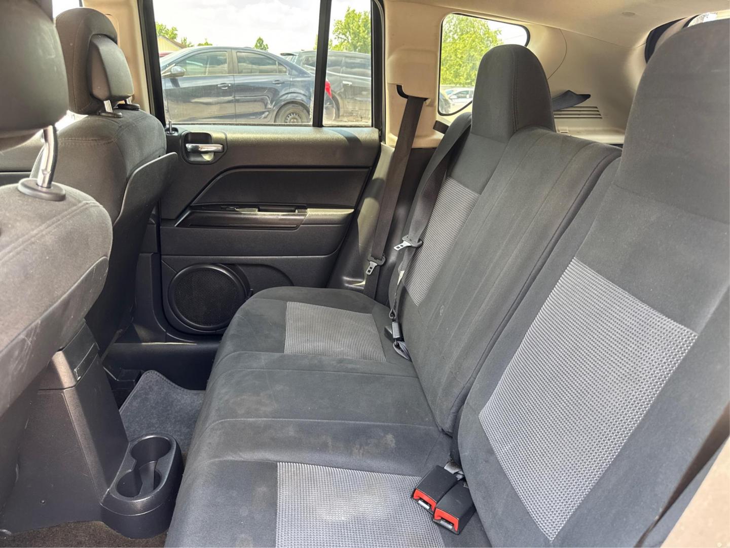 2014 Jeep Compass (1C4NJDBBXED) , located at 16710 Clay Rd., Houston, TX, 77084, (281) 859-7900, 29.834864, -95.656166 - Photo#11