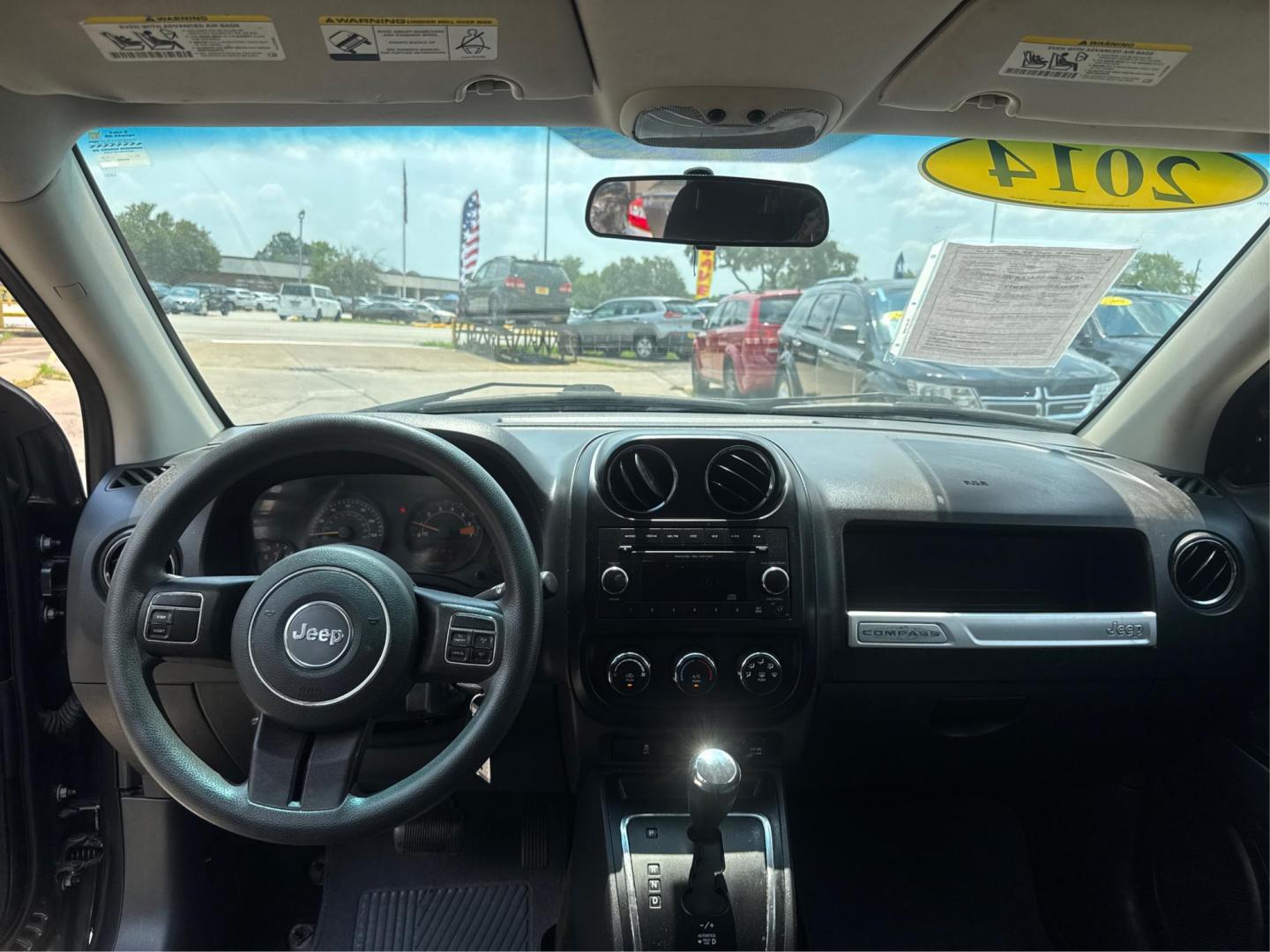 2014 Jeep Compass (1C4NJDBBXED) , located at 16710 Clay Rd., Houston, TX, 77084, (281) 859-7900, 29.834864, -95.656166 - Photo#12
