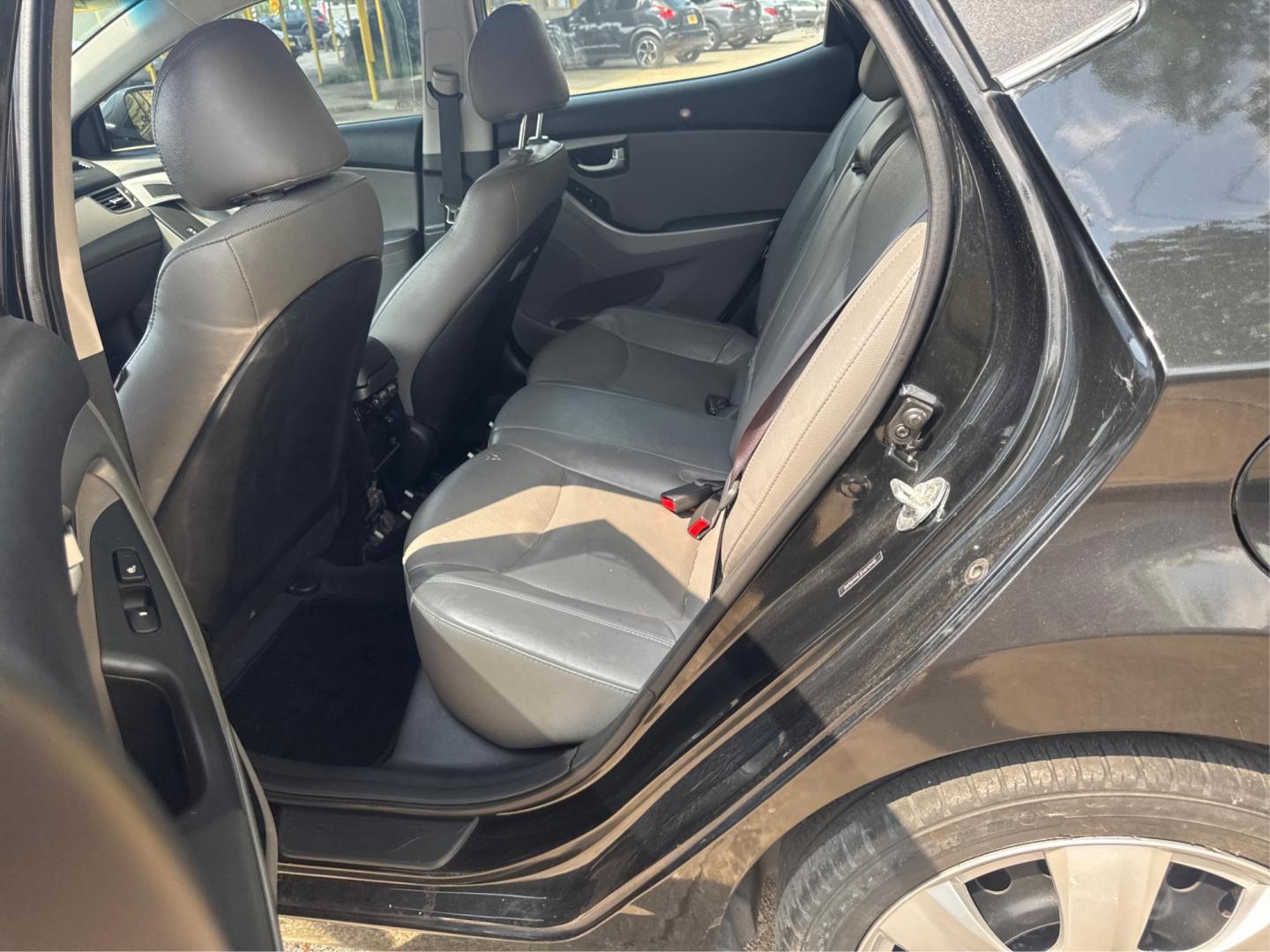 2015 Hyundai Elantra Limited (5NPDH4AE3FH) with an 1.8L L4 DOHC 16V engine, 6-Speed Automatic transmission, located at 16710 Clay Rd., Houston, TX, 77084, (281) 859-7900, 29.834864, -95.656166 - Photo#9