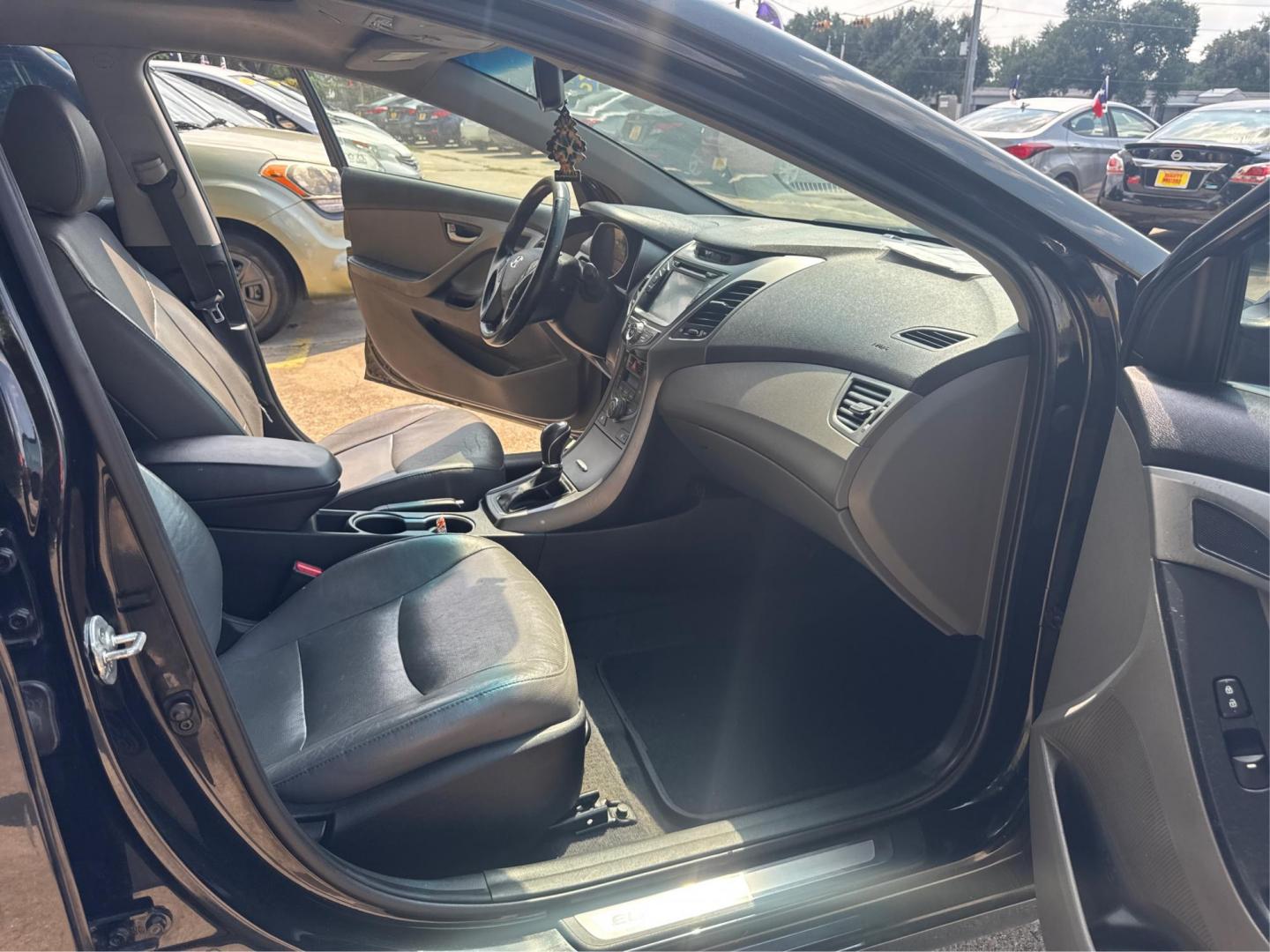 2015 Hyundai Elantra Limited (5NPDH4AE3FH) with an 1.8L L4 DOHC 16V engine, 6-Speed Automatic transmission, located at 16710 Clay Rd., Houston, TX, 77084, (281) 859-7900, 29.834864, -95.656166 - Photo#10