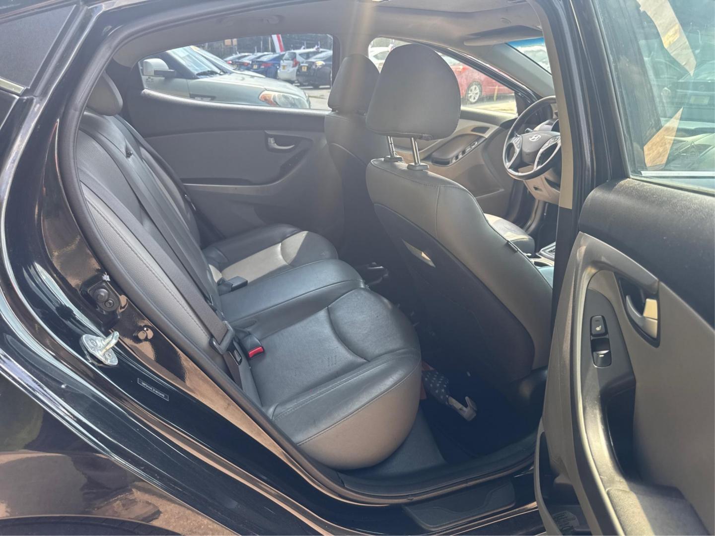 2015 Hyundai Elantra Limited (5NPDH4AE3FH) with an 1.8L L4 DOHC 16V engine, 6-Speed Automatic transmission, located at 16710 Clay Rd., Houston, TX, 77084, (281) 859-7900, 29.834864, -95.656166 - Photo#11