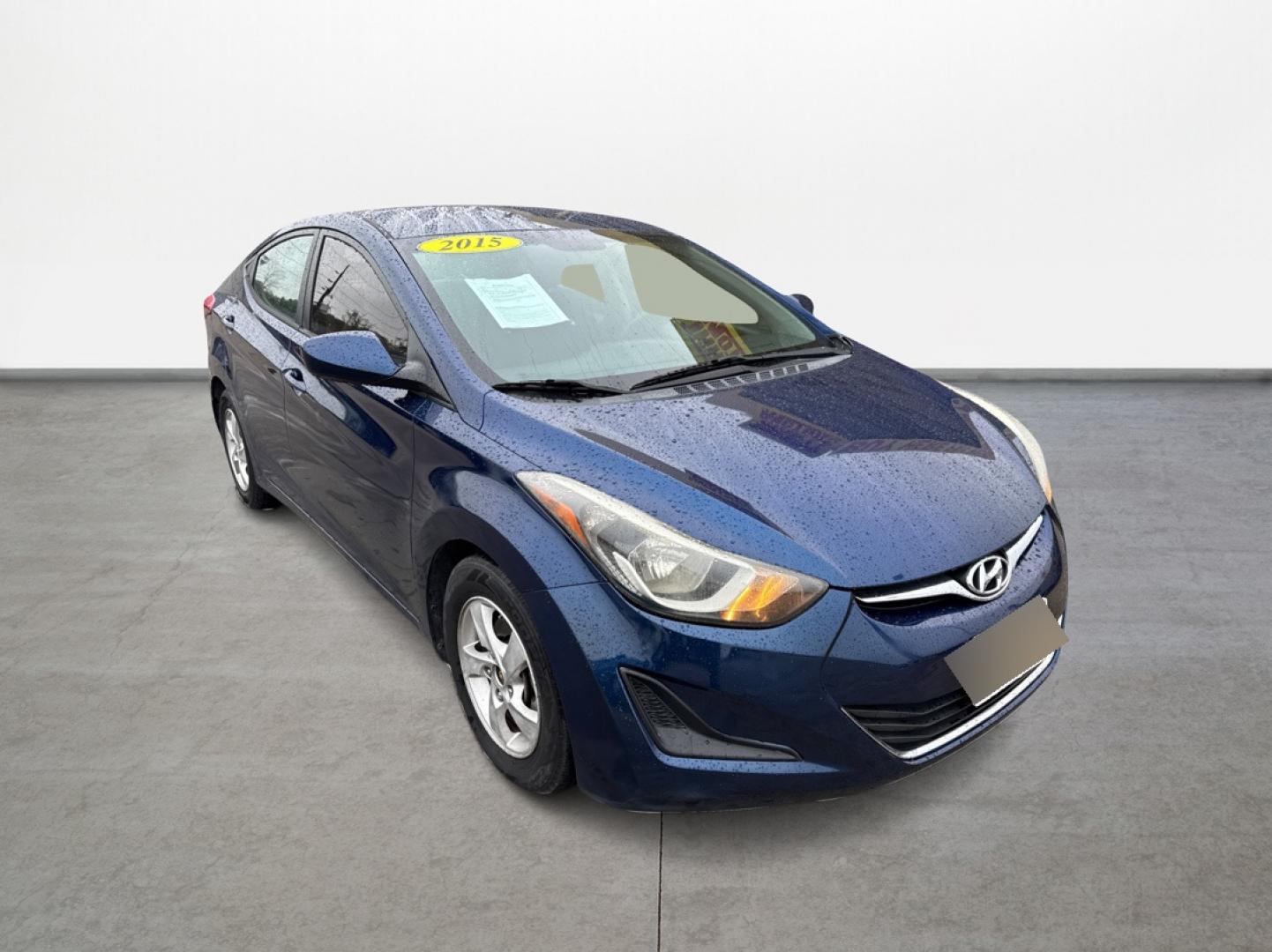 2015 Blue /Tan Hyundai Elantra (5NPDH4AE3FH) , located at 16710 Clay Rd., Houston, TX, 77084, (281) 859-7900, 29.834864, -95.656166 - Photo#2