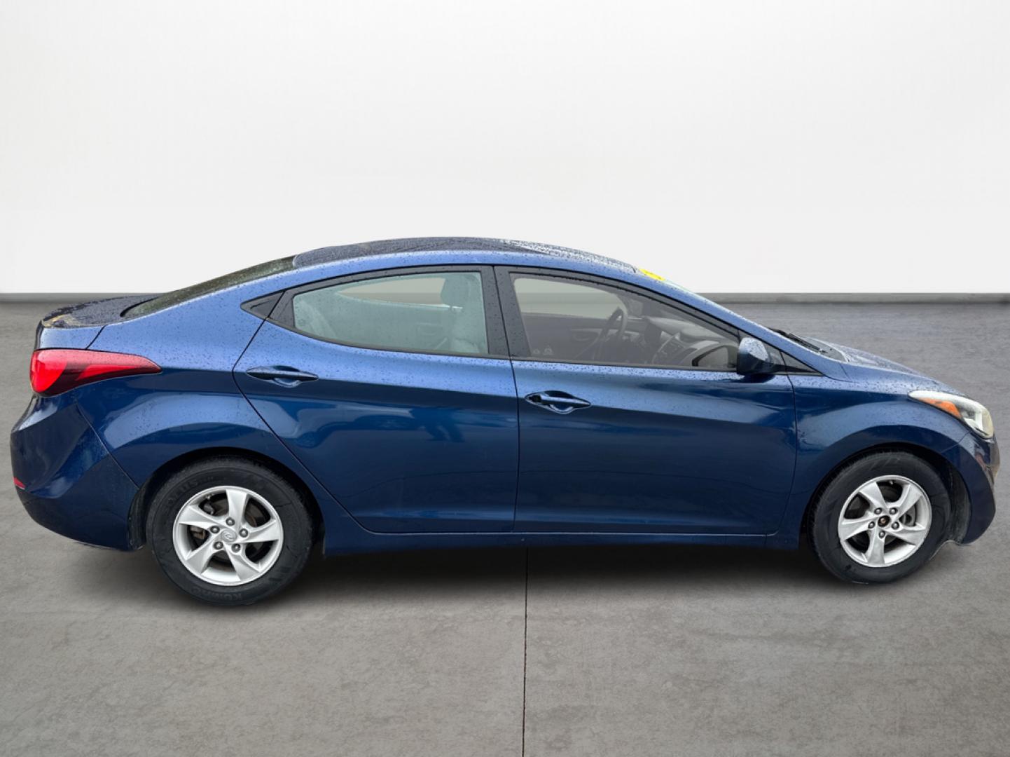 2015 Blue /Tan Hyundai Elantra (5NPDH4AE3FH) , located at 16710 Clay Rd., Houston, TX, 77084, (281) 859-7900, 29.834864, -95.656166 - Photo#3