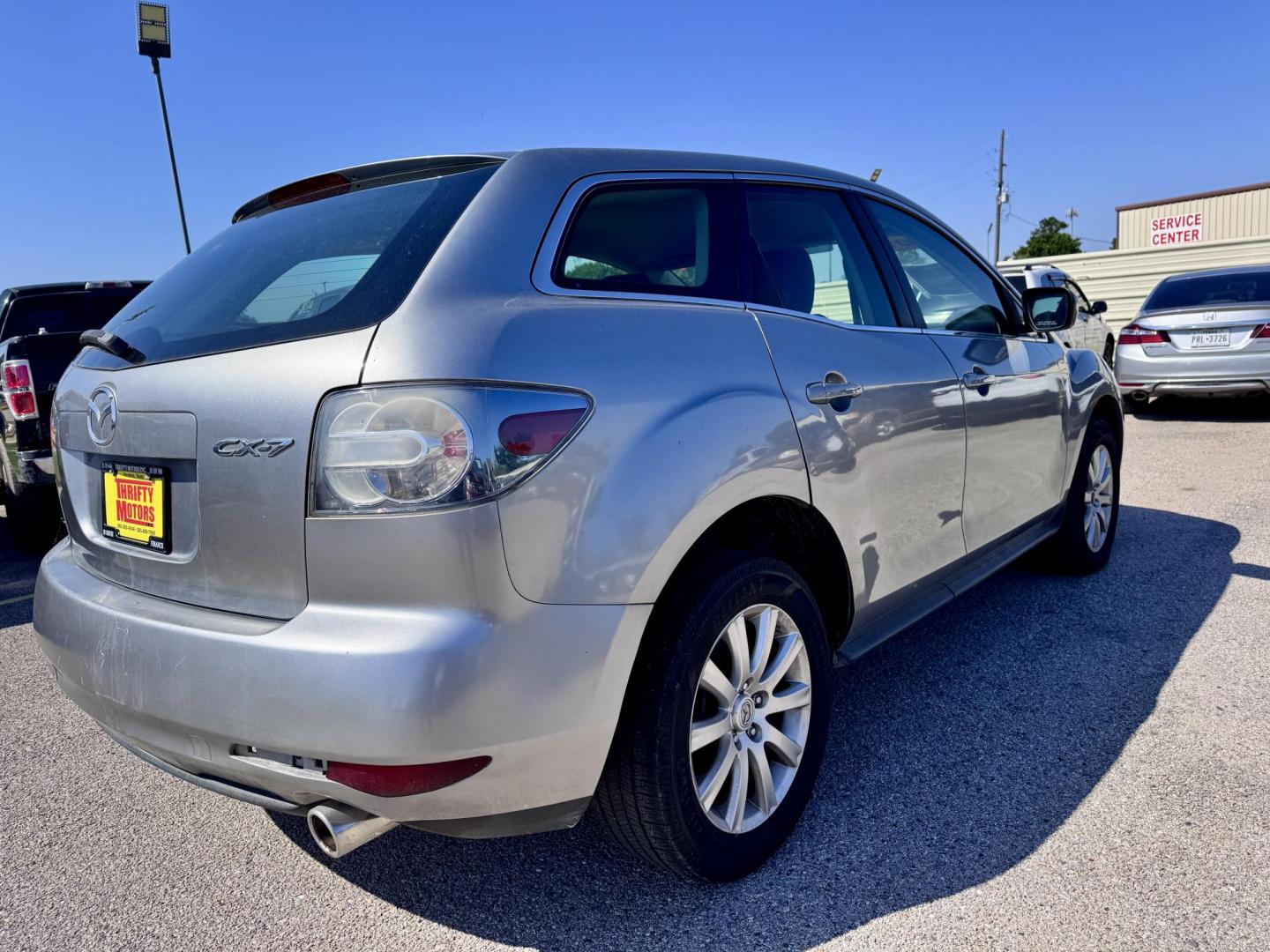 2010 Silver /Gray Mazda CX-7 (JM3ER2WM9A0) with an 2.5L I4 2.5L I4 engine, Automatic 5-Speed transmission, located at 16710 Clay Rd., Houston, TX, 77084, (281) 859-7900, 29.834864, -95.656166 - Photo#4