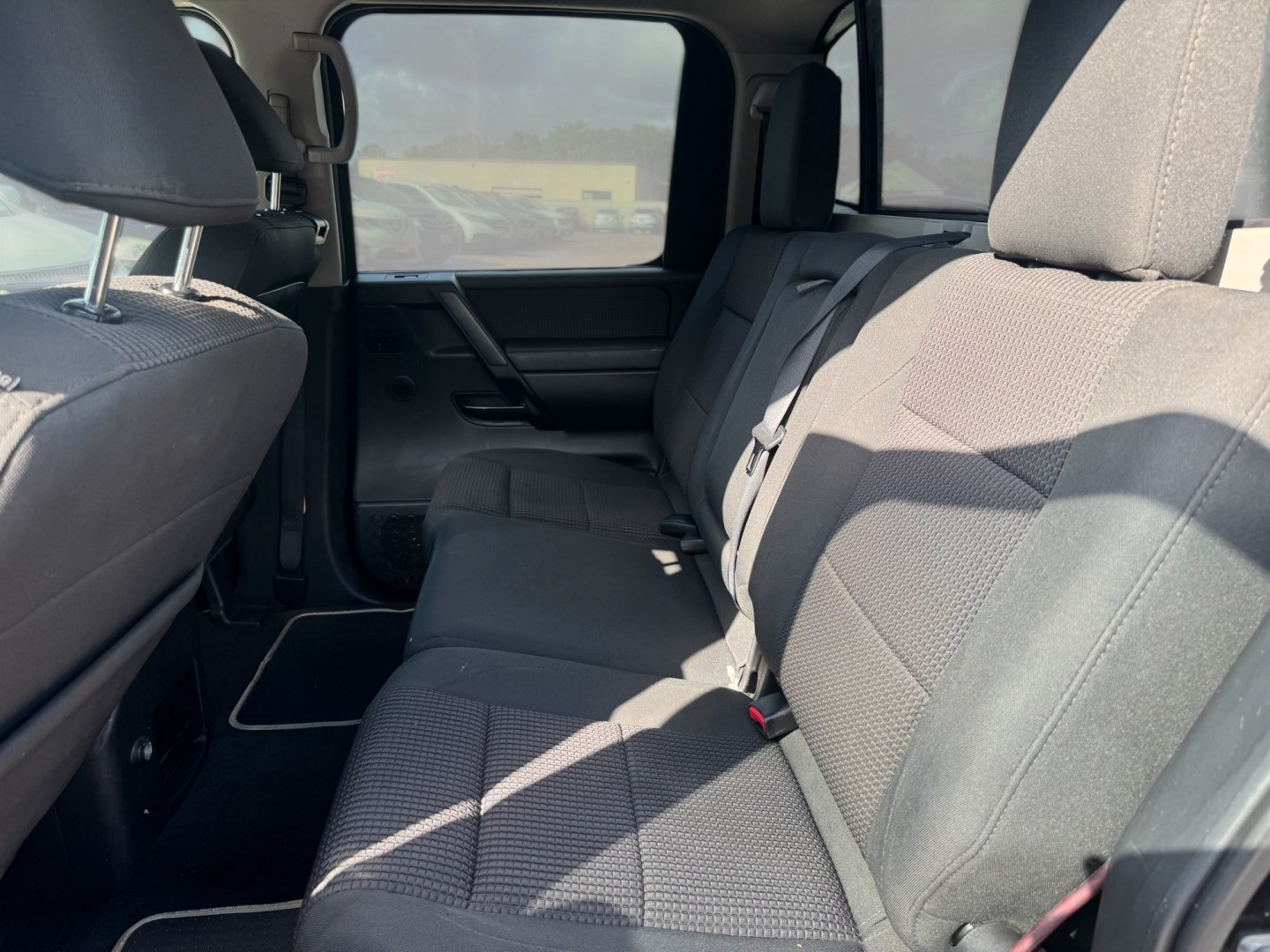 2012 Nissan Titan (1N6BA0ED2CN) , located at 16710 Clay Rd., Houston, TX, 77084, (281) 859-7900, 29.834864, -95.656166- Photo#12
