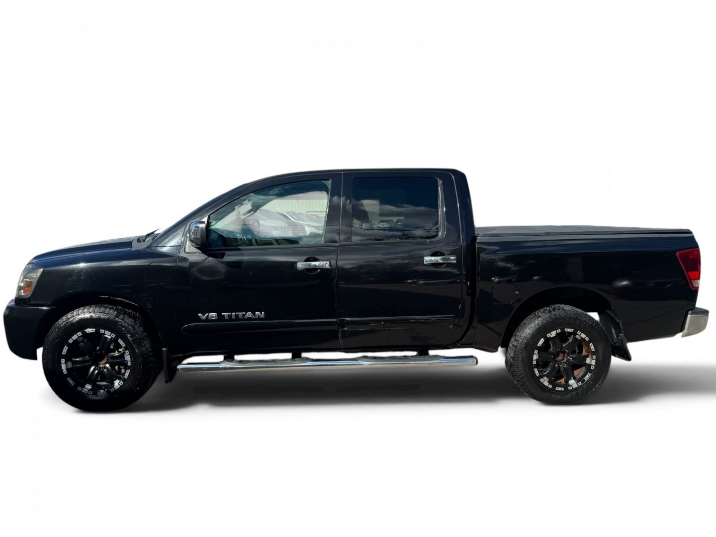 2012 Nissan Titan (1N6BA0ED2CN) , located at 16710 Clay Rd., Houston, TX, 77084, (281) 859-7900, 29.834864, -95.656166- Photo#2