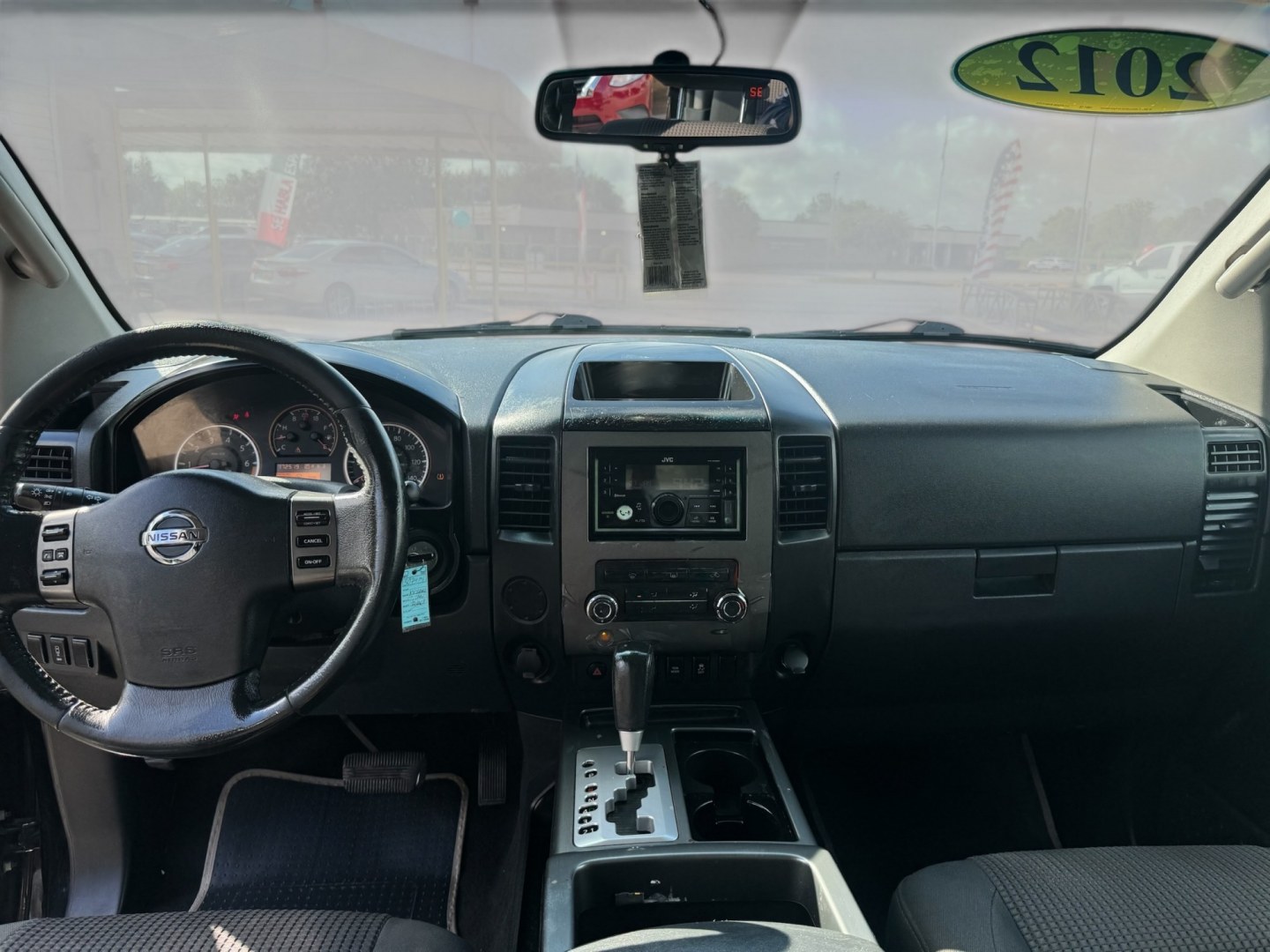 2012 Nissan Titan (1N6BA0ED2CN) , located at 16710 Clay Rd., Houston, TX, 77084, (281) 859-7900, 29.834864, -95.656166- Photo#10