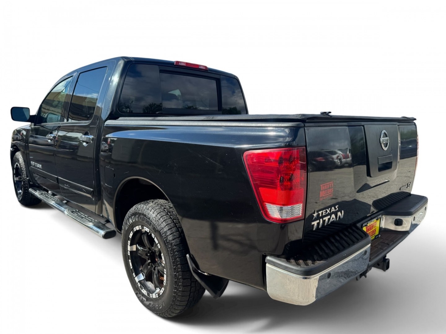 2012 Nissan Titan (1N6BA0ED2CN) , located at 16710 Clay Rd., Houston, TX, 77084, (281) 859-7900, 29.834864, -95.656166- Photo#5