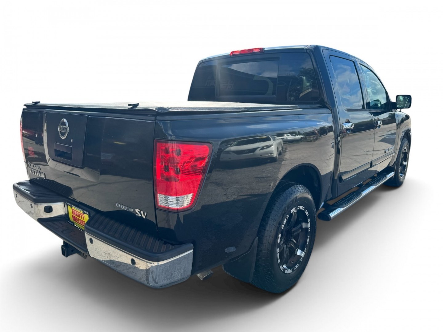 2012 Nissan Titan (1N6BA0ED2CN) , located at 16710 Clay Rd., Houston, TX, 77084, (281) 859-7900, 29.834864, -95.656166- Photo#7