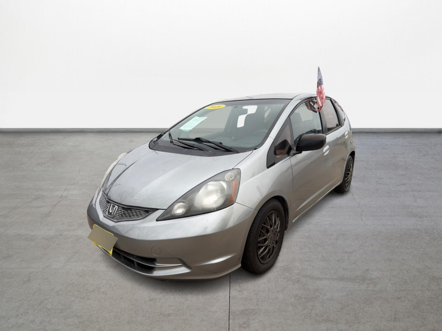 2009 Honda Fit 5-Speed AT (JHMGE882X9S) with an 1.5L L4 SOHC 16V engine, 5-Speed Automatic transmission, located at 16710 Clay Rd., Houston, TX, 77084, (281) 859-7900, 29.834864, -95.656166 - Photo#0