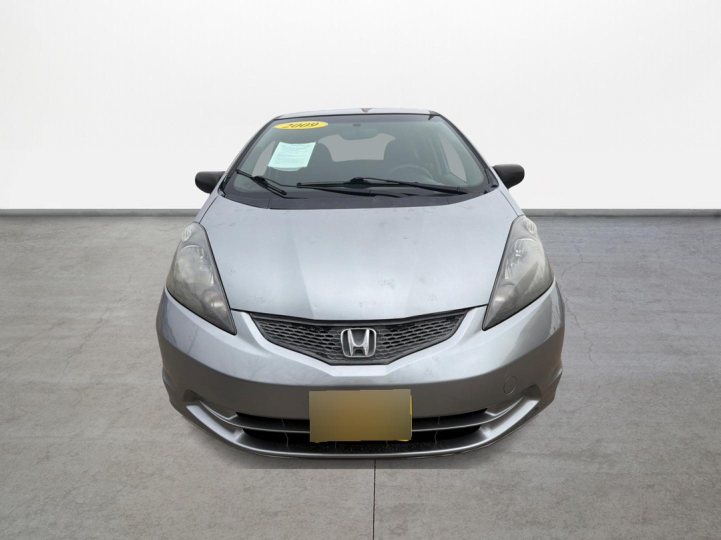 2009 Honda Fit 5-Speed AT (JHMGE882X9S) with an 1.5L L4 SOHC 16V engine, 5-Speed Automatic transmission, located at 16710 Clay Rd., Houston, TX, 77084, (281) 859-7900, 29.834864, -95.656166 - Photo#1
