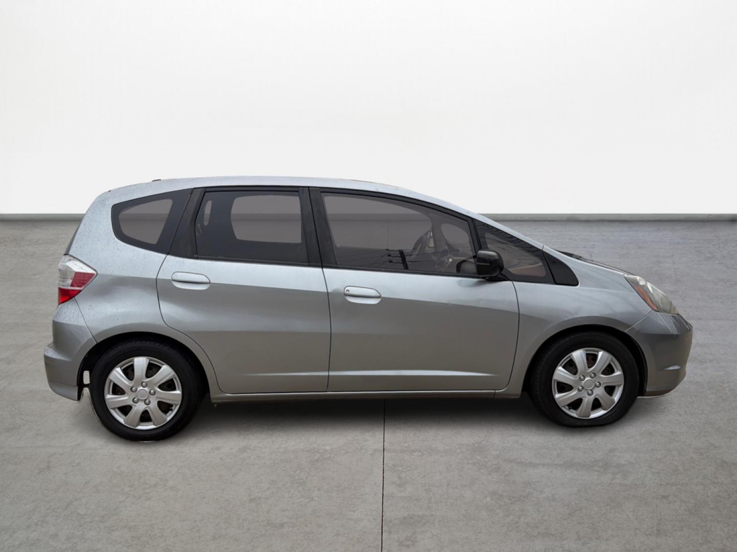 2009 Honda Fit 5-Speed AT (JHMGE882X9S) with an 1.5L L4 SOHC 16V engine, 5-Speed Automatic transmission, located at 16710 Clay Rd., Houston, TX, 77084, (281) 859-7900, 29.834864, -95.656166 - Photo#3