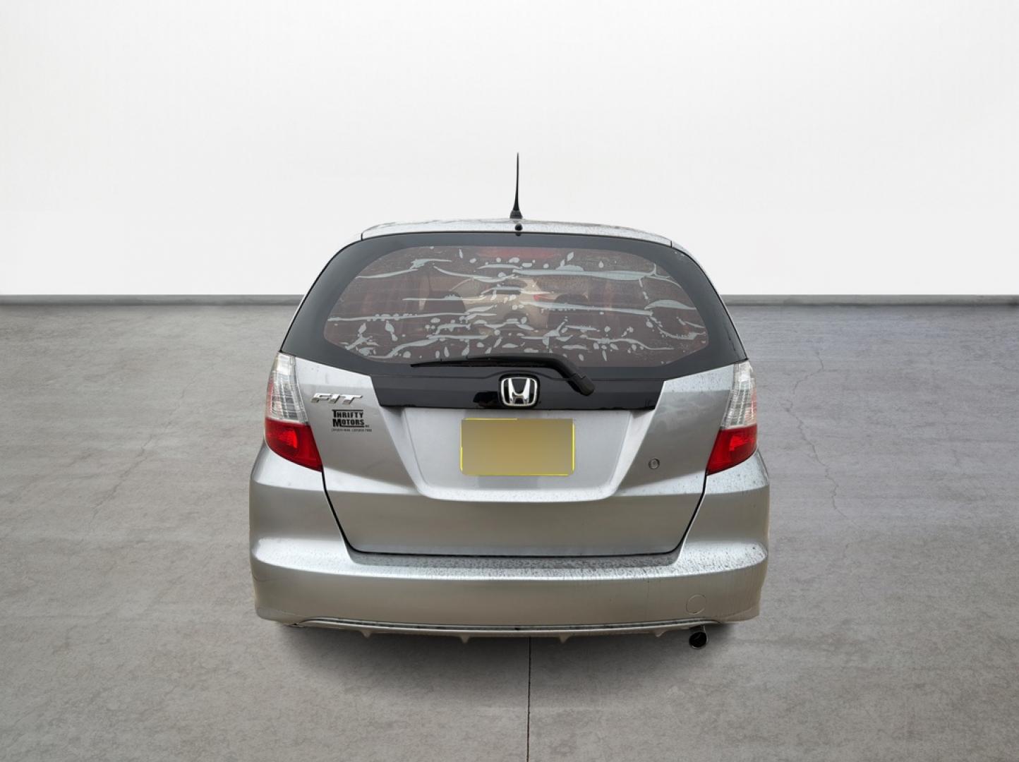 2009 Honda Fit 5-Speed AT (JHMGE882X9S) with an 1.5L L4 SOHC 16V engine, 5-Speed Automatic transmission, located at 16710 Clay Rd., Houston, TX, 77084, (281) 859-7900, 29.834864, -95.656166 - Photo#5