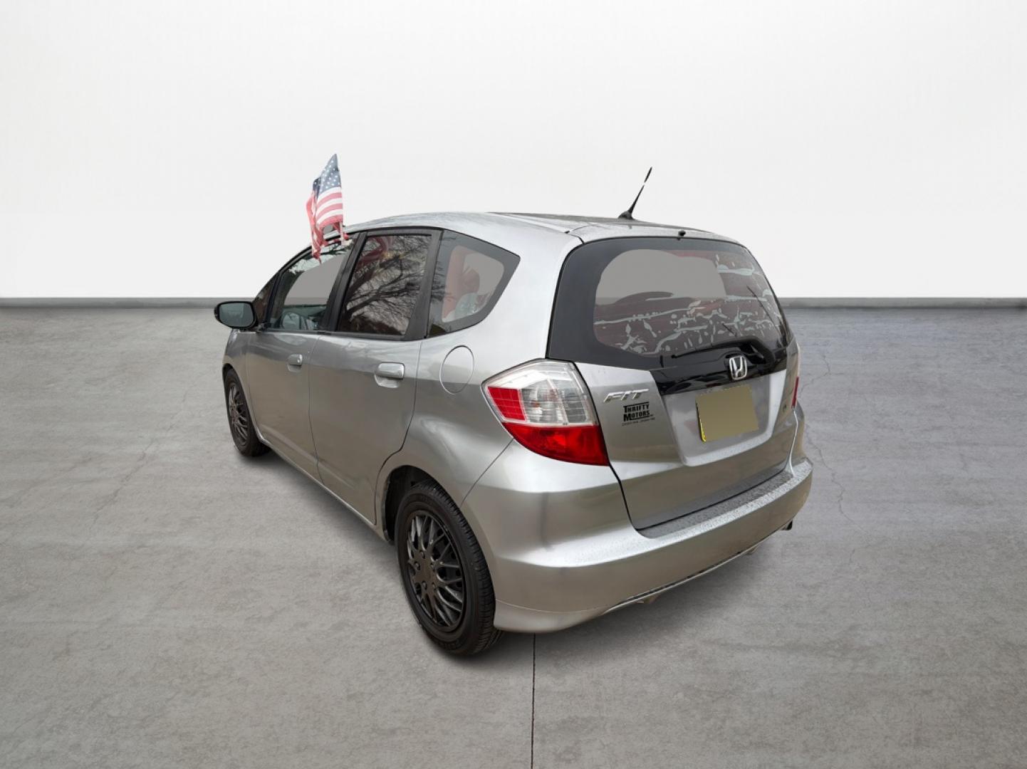 2009 Honda Fit 5-Speed AT (JHMGE882X9S) with an 1.5L L4 SOHC 16V engine, 5-Speed Automatic transmission, located at 16710 Clay Rd., Houston, TX, 77084, (281) 859-7900, 29.834864, -95.656166 - Photo#6