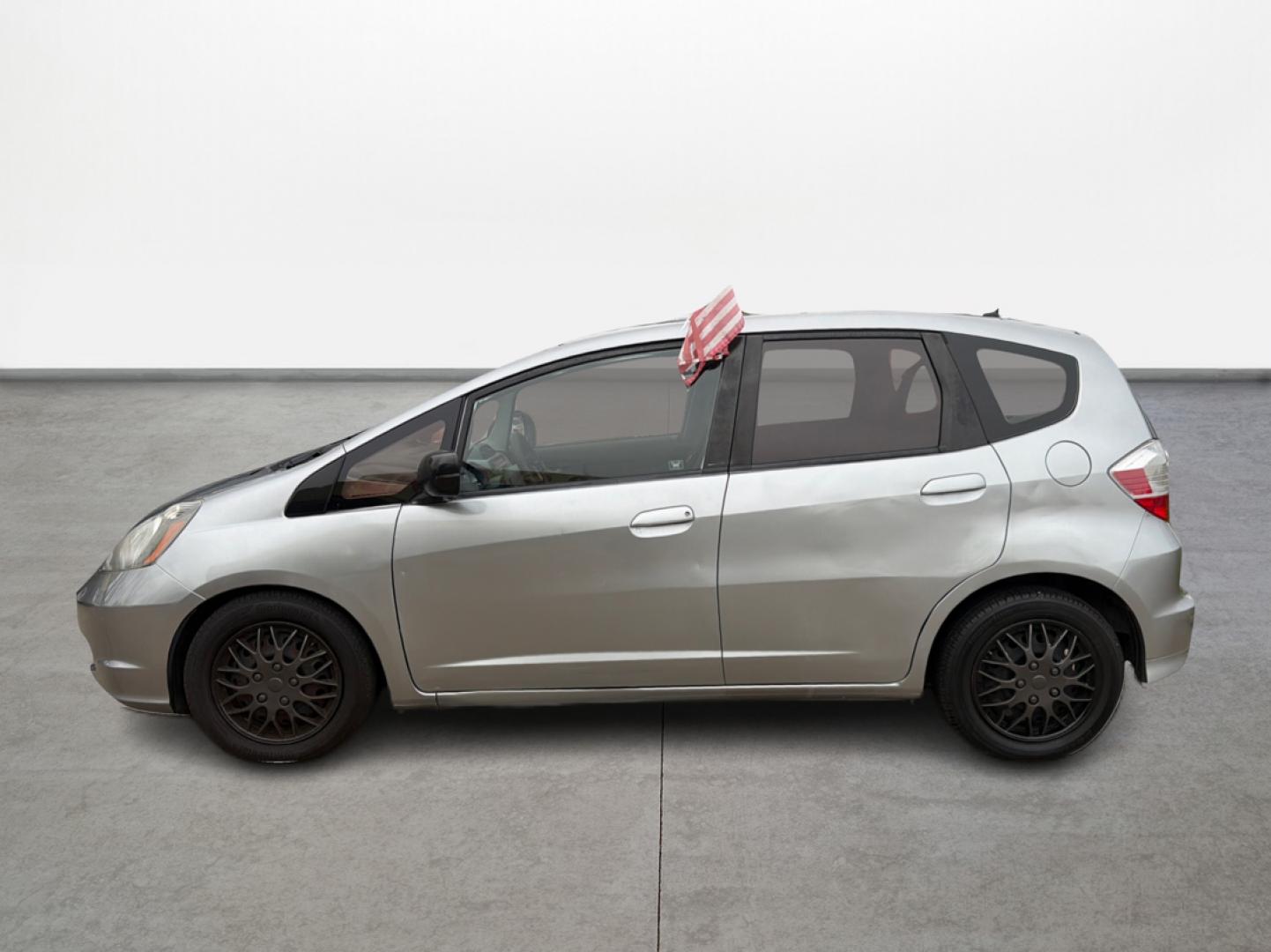 2009 Honda Fit 5-Speed AT (JHMGE882X9S) with an 1.5L L4 SOHC 16V engine, 5-Speed Automatic transmission, located at 16710 Clay Rd., Houston, TX, 77084, (281) 859-7900, 29.834864, -95.656166 - Photo#7