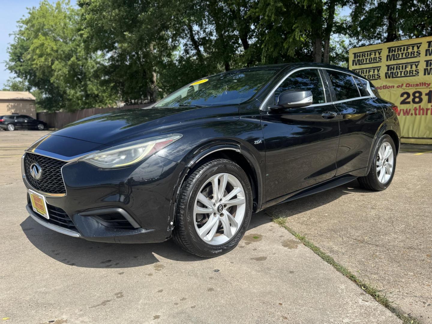 2017 Black /Black Infiniti QX30 (SJKCH5CP2HA) , located at 16710 Clay Rd., Houston, TX, 77084, (281) 859-7900, 29.834864, -95.656166 - Photo#7