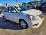 2018 White /Gray Nissan Versa (3N1CN7AP4JL) , Automatic transmission, located at 16710 Clay Rd., Houston, TX, 77084, (281) 859-7900, 29.834864, -95.656166 - Photo#1