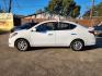 2018 White /Gray Nissan Versa (3N1CN7AP4JL) , Automatic transmission, located at 16710 Clay Rd., Houston, TX, 77084, (281) 859-7900, 29.834864, -95.656166 - Photo#4