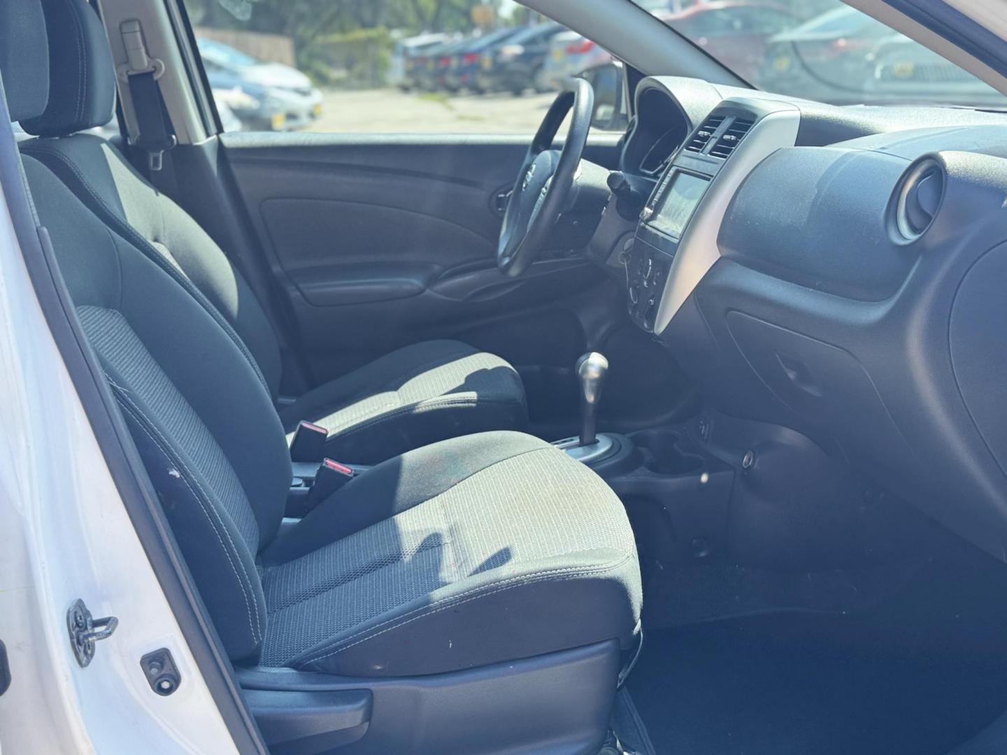 2019 Nissan Versa (3N1CN7AP1KL) , located at 16710 Clay Rd., Houston, TX, 77084, (281) 859-7900, 29.834864, -95.656166 - Photo#8