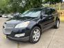 2012 Black /Beige Chevrolet Traverse (1GNKRLED3CJ) , located at 16710 Clay Rd., Houston, TX, 77084, (281) 859-7900, 29.834864, -95.656166 - Photo#1