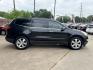 2012 Black /Beige Chevrolet Traverse (1GNKRLED3CJ) , located at 16710 Clay Rd., Houston, TX, 77084, (281) 859-7900, 29.834864, -95.656166 - Photo#3