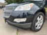 2012 Black /Beige Chevrolet Traverse (1GNKRLED3CJ) , located at 16710 Clay Rd., Houston, TX, 77084, (281) 859-7900, 29.834864, -95.656166 - Photo#9