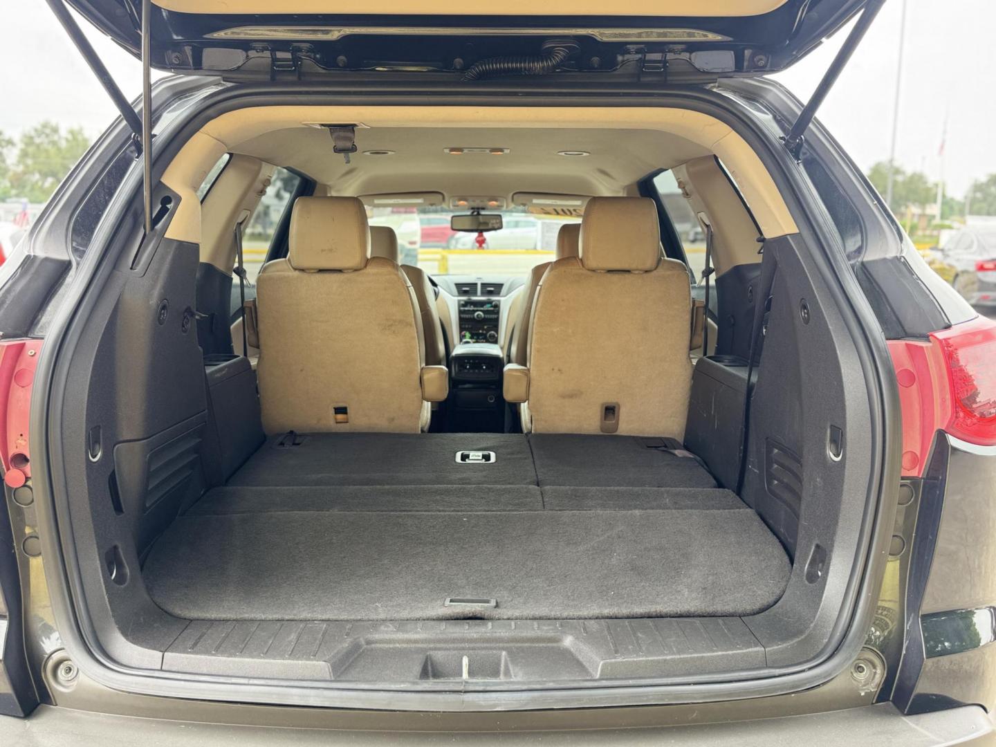 2012 Black /Beige Chevrolet Traverse (1GNKRLED3CJ) , located at 16710 Clay Rd., Houston, TX, 77084, (281) 859-7900, 29.834864, -95.656166 - Photo#11