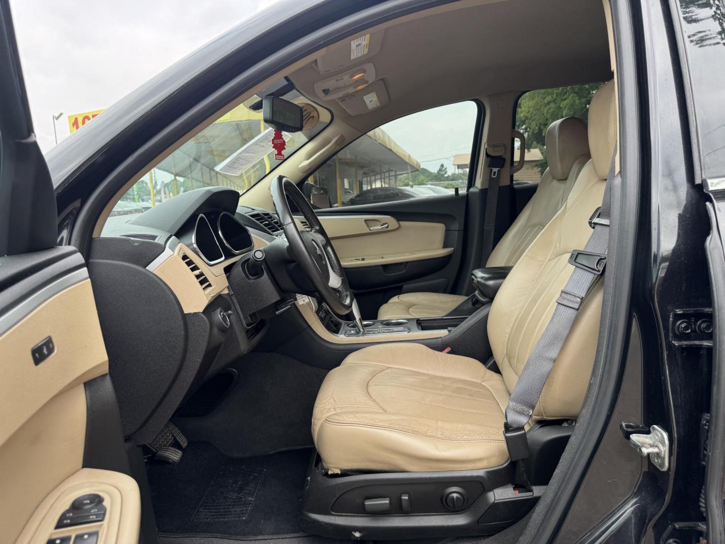 2012 Black /Beige Chevrolet Traverse (1GNKRLED3CJ) , located at 16710 Clay Rd., Houston, TX, 77084, (281) 859-7900, 29.834864, -95.656166 - Photo#13