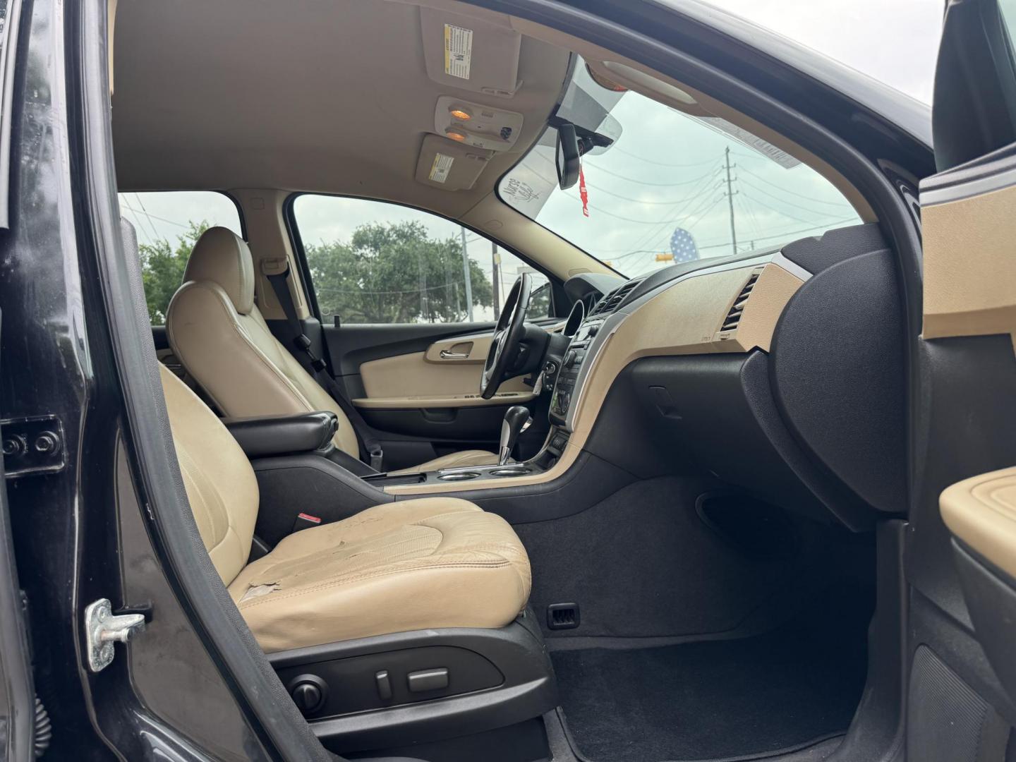 2012 Black /Beige Chevrolet Traverse (1GNKRLED3CJ) , located at 16710 Clay Rd., Houston, TX, 77084, (281) 859-7900, 29.834864, -95.656166 - Photo#17
