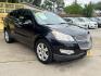 2012 Black /Beige Chevrolet Traverse (1GNKRLED3CJ) , located at 16710 Clay Rd., Houston, TX, 77084, (281) 859-7900, 29.834864, -95.656166 - Photo#20