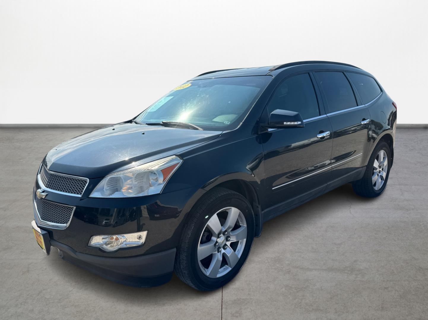 2012 Black /Beige Chevrolet Traverse (1GNKRLED3CJ) , located at 16710 Clay Rd., Houston, TX, 77084, (281) 859-7900, 29.834864, -95.656166 - Photo#0
