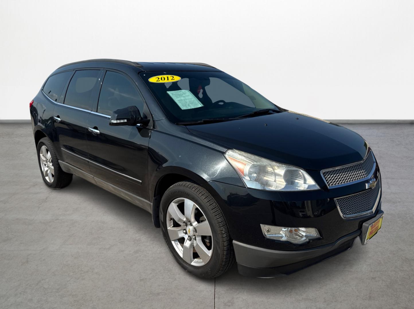2012 Black /Beige Chevrolet Traverse (1GNKRLED3CJ) , located at 16710 Clay Rd., Houston, TX, 77084, (281) 859-7900, 29.834864, -95.656166 - Photo#2