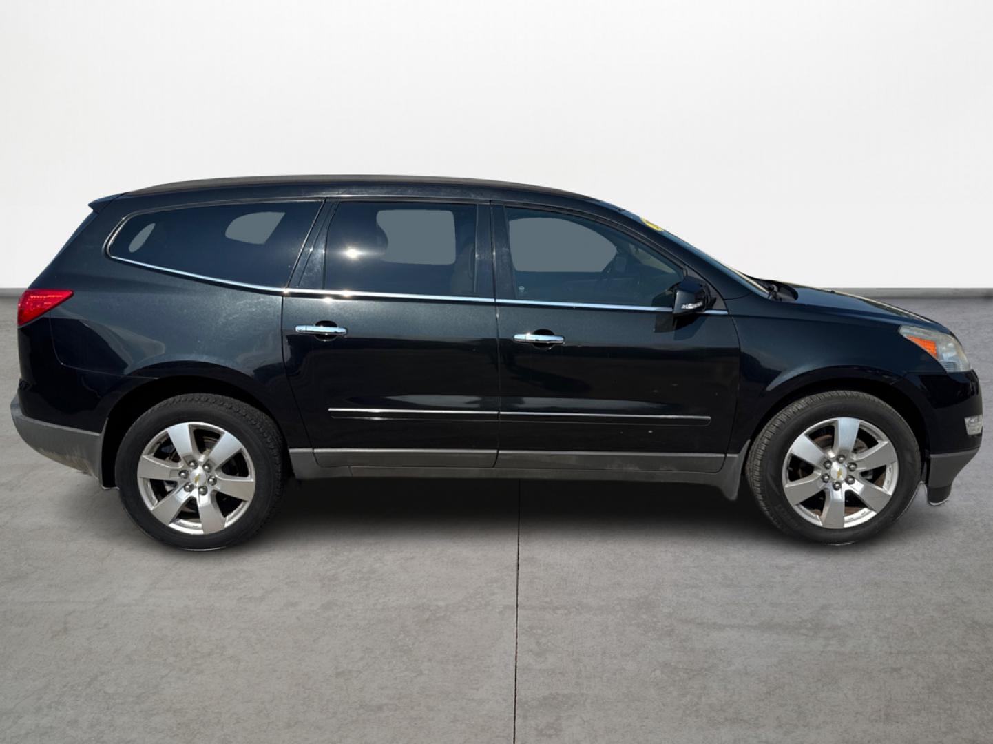 2012 Black /Beige Chevrolet Traverse (1GNKRLED3CJ) , located at 16710 Clay Rd., Houston, TX, 77084, (281) 859-7900, 29.834864, -95.656166 - Photo#3