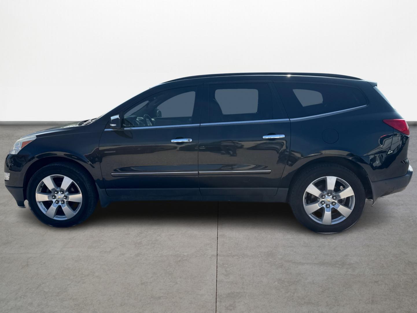 2012 Black /Beige Chevrolet Traverse (1GNKRLED3CJ) , located at 16710 Clay Rd., Houston, TX, 77084, (281) 859-7900, 29.834864, -95.656166 - Photo#7