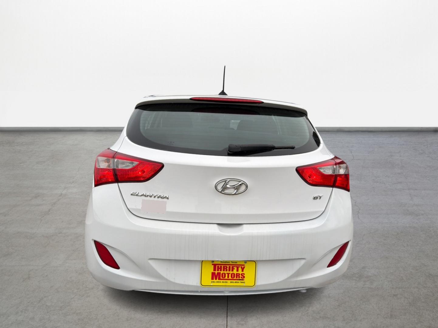 2017 White /Black Hyundai Elantra GT M/T (KMHD35LH7HU) with an 2.0L L4 16V DOHC engine, 6M transmission, located at 16710 Clay Rd., Houston, TX, 77084, (281) 859-7900, 29.834864, -95.656166 - Photo#9