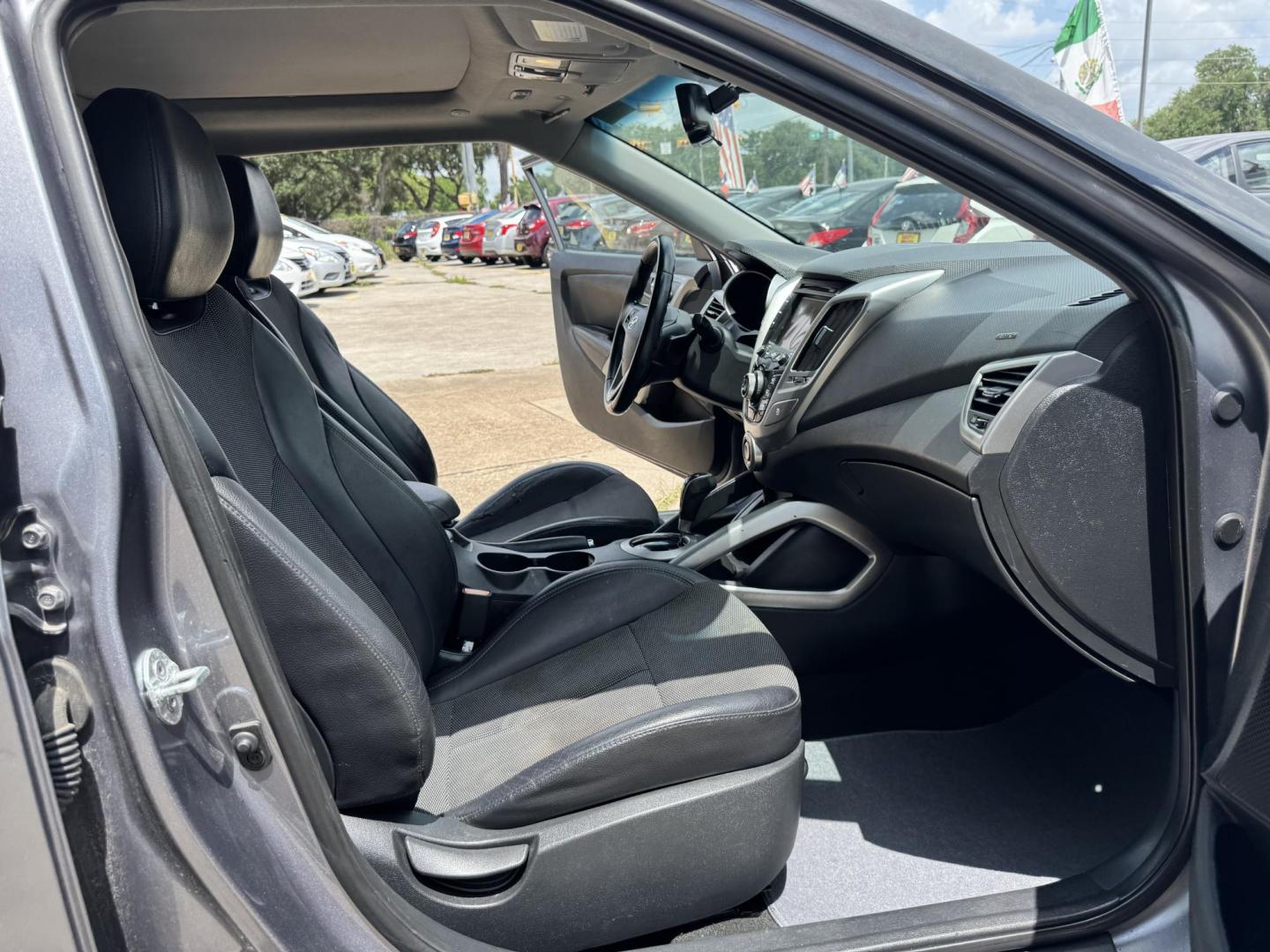 2013 Gray /Gray Hyundai Veloster Base (KMHTC6AD6DU) with an 1.6L L4 DOHC 16V engine, located at 16710 Clay Rd., Houston, TX, 77084, (281) 859-7900, 29.834864, -95.656166 - Photo#25