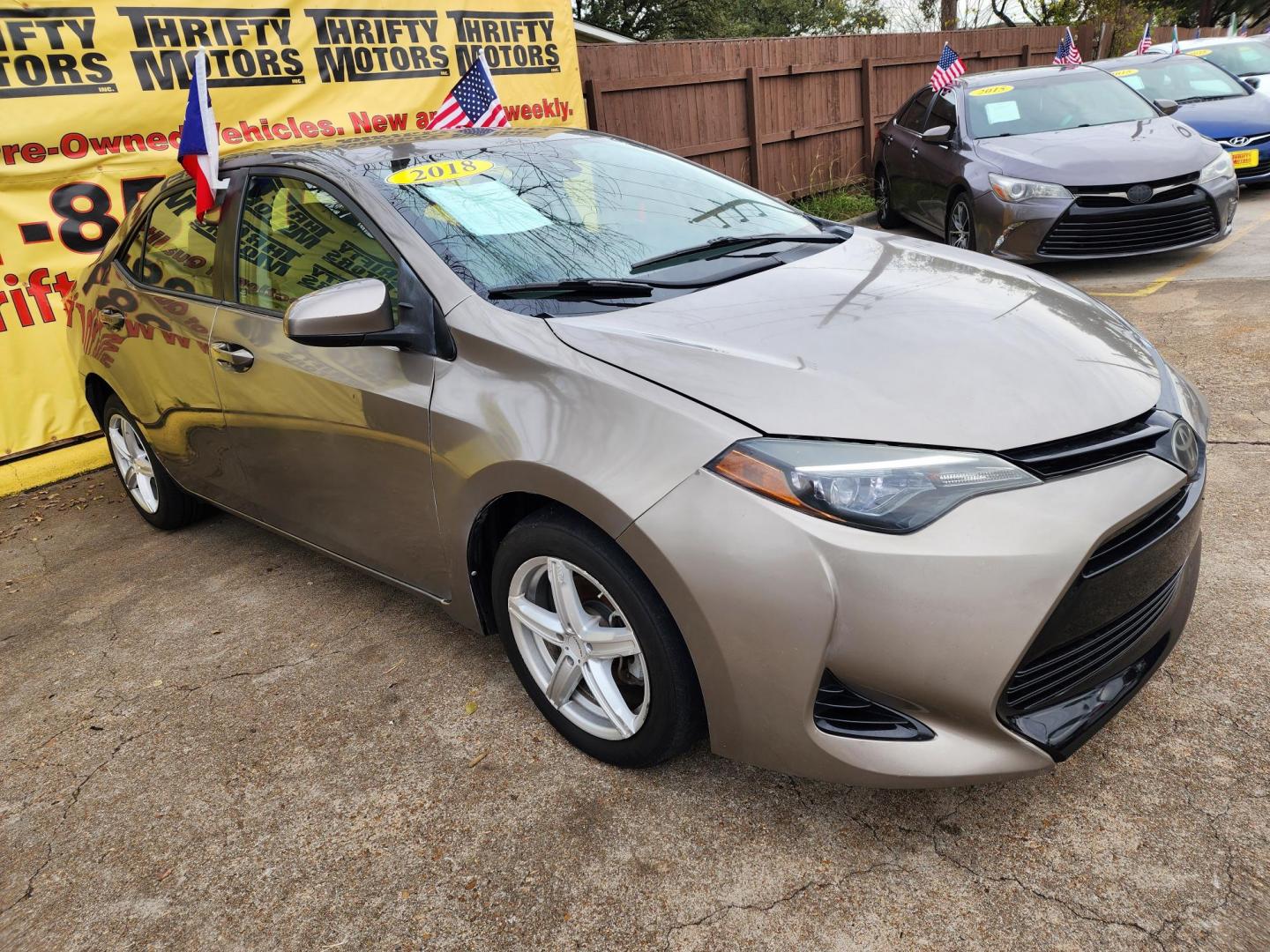 2018 Gray /Gray Toyota Corolla SE 6M (5YFBURHE8JP) with an 1.8L L4 DOHC 16V engine, Automatic 6-Speed transmission, located at 16710 Clay Rd., Houston, TX, 77084, (281) 859-7900, 29.834864, -95.656166 - Photo#2