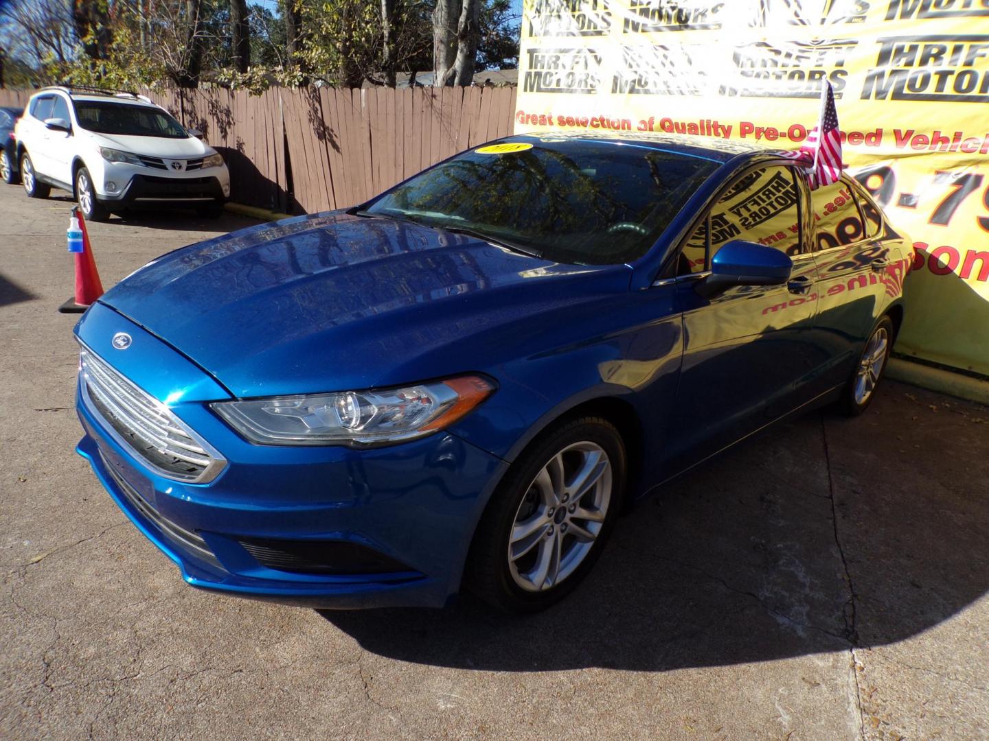 2018 Blue /Gray Ford Fusion SE (3FA6P0HD4JR) with an 1.5L L4 DOHC 16V engine, 6A transmission, located at 16710 Clay Rd., Houston, TX, 77084, (281) 859-7900, 29.834864, -95.656166 - Photo#1