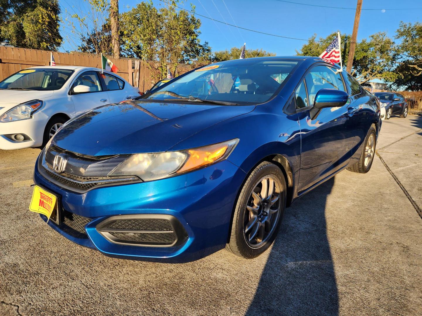 2014 Blue /Gray Honda Civic LX Coupe CVT (2HGFG3B50EH) with an 2.3L L4 SOHC 16V engine, Continuously Variable Transmission transmission, located at 16710 Clay Rd., Houston, TX, 77084, (281) 859-7900, 29.834864, -95.656166 - Photo#4