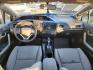 2014 Blue /Gray Honda Civic LX Coupe CVT (2HGFG3B50EH) with an 2.3L L4 SOHC 16V engine, Continuously Variable Transmission transmission, located at 16710 Clay Rd., Houston, TX, 77084, (281) 859-7900, 29.834864, -95.656166 - Photo#10