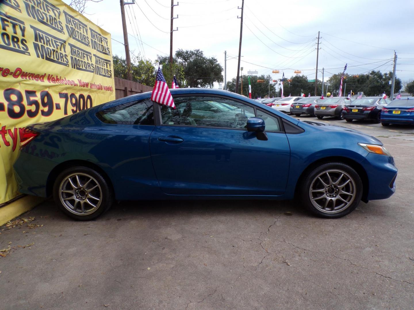 2014 Blue /Gray Honda Civic LX Coupe CVT (2HGFG3B50EH) with an 2.3L L4 SOHC 16V engine, Continuously Variable Transmission transmission, located at 16710 Clay Rd., Houston, TX, 77084, (281) 859-7900, 29.834864, -95.656166 - Photo#2
