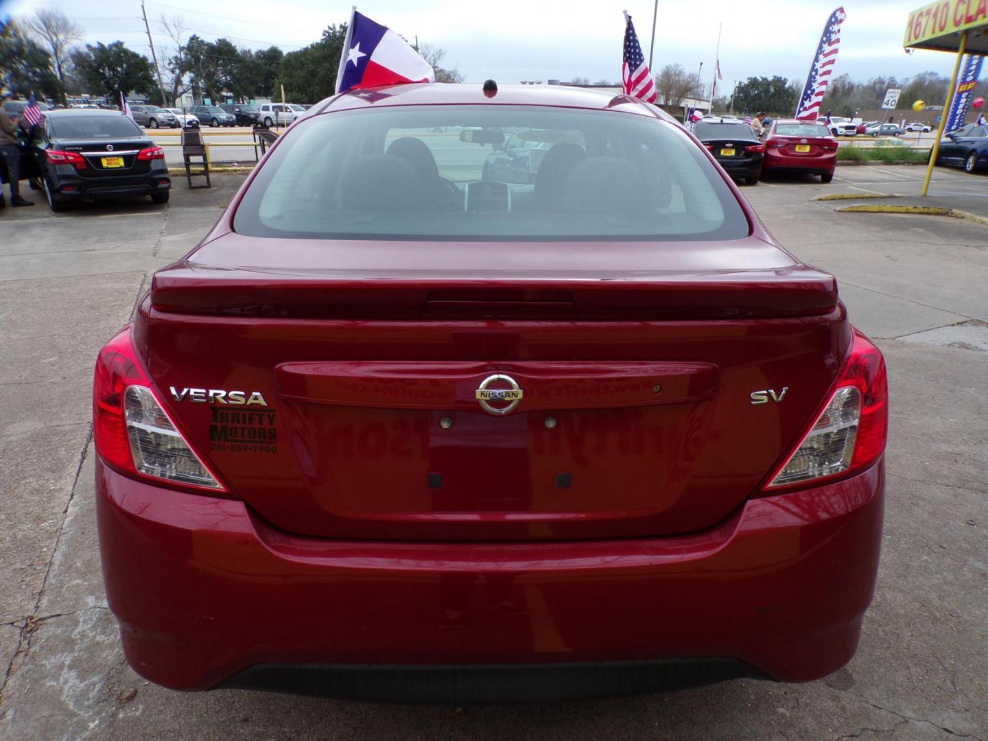 2018 Red /Gray Nissan Versa 1.6 SL Sedan (3N1CN7AP5JL) with an 1.6L L4 DOHC 16V engine, Automatic transmission, located at 16710 Clay Rd., Houston, TX, 77084, (281) 859-7900, 29.834864, -95.656166 - Photo#5