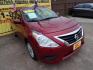 2018 Red /Gray Nissan Versa 1.6 SL Sedan (3N1CN7AP5JL) with an 1.6L L4 DOHC 16V engine, Automatic transmission, located at 16710 Clay Rd., Houston, TX, 77084, (281) 859-7900, 29.834864, -95.656166 - Photo#1