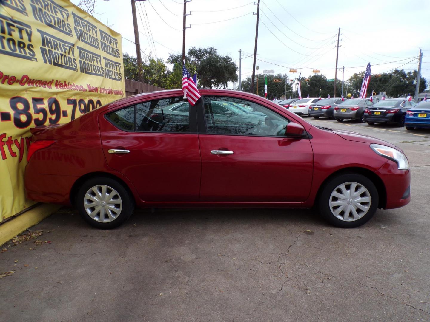 2018 Red /Gray Nissan Versa 1.6 SL Sedan (3N1CN7AP5JL) with an 1.6L L4 DOHC 16V engine, Automatic transmission, located at 16710 Clay Rd., Houston, TX, 77084, (281) 859-7900, 29.834864, -95.656166 - Photo#4