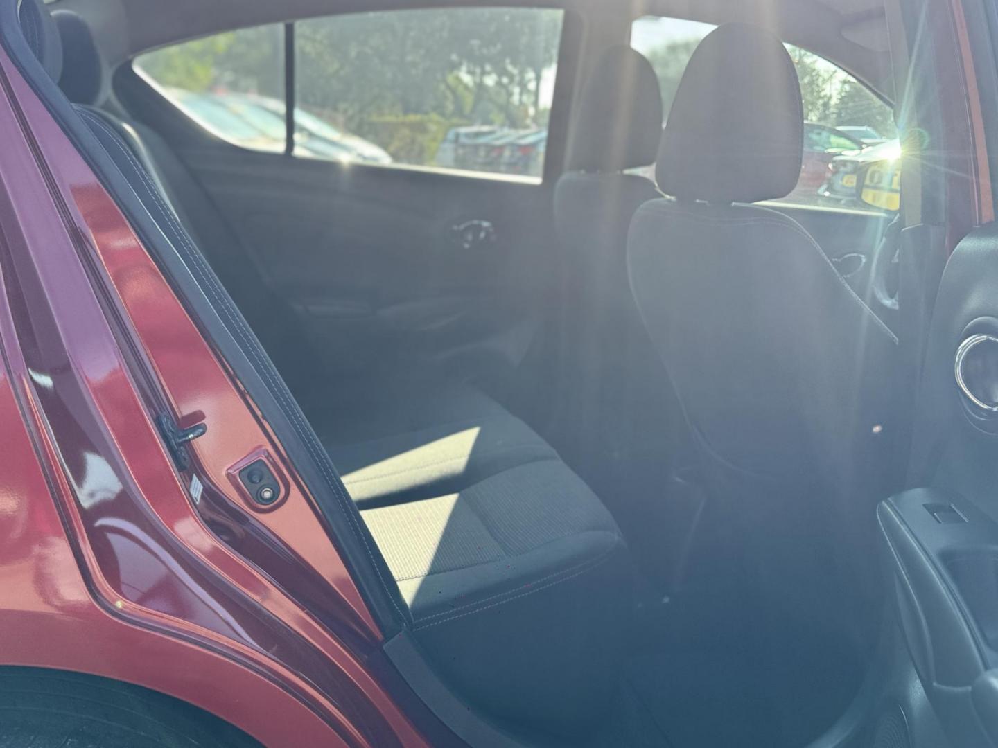 2018 Red /Gray Nissan Versa 1.6 SL Sedan (3N1CN7AP5JL) with an 1.6L L4 DOHC 16V engine, Automatic transmission, located at 16710 Clay Rd., Houston, TX, 77084, (281) 859-7900, 29.834864, -95.656166 - Photo#11